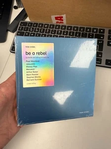New Order : Be a Rebel Remixed CD (2021) New & Sealed Dented Cover - Picture 1 of 3
