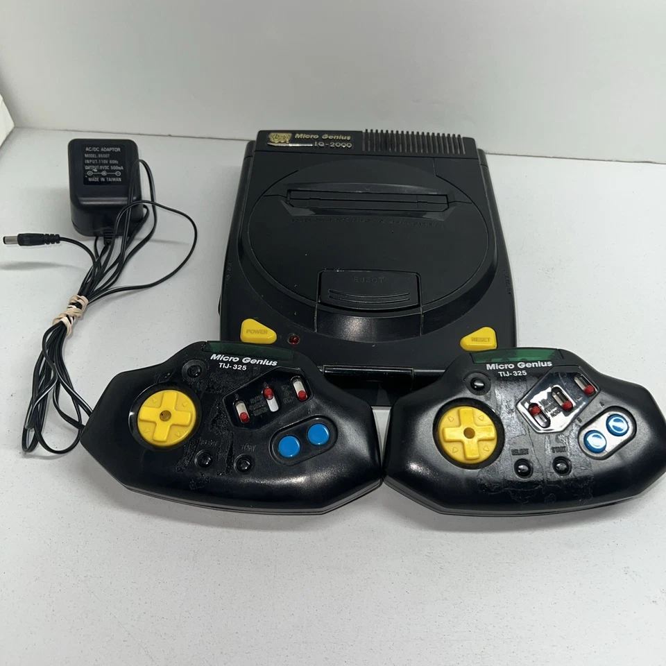 Micro Genius IQ-2000 con Controladores Juego y Cable/Falta Cable Av Sin Probar Foto 1 de 4