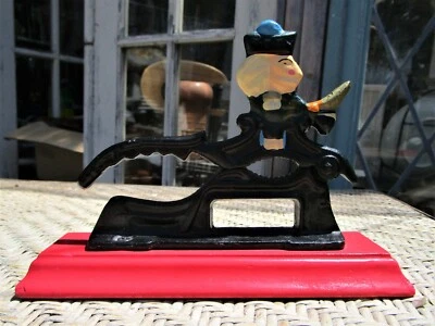 Cast Iron Soldier Nut Cracker Red Wooden Base Nut Cracker - Image 1 of 4