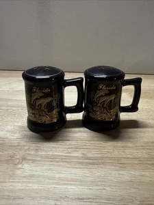 Vintage Florida Souvenir Black & Gold Ceramic Salt And Pepper Shakers Set - Picture 1 of 8