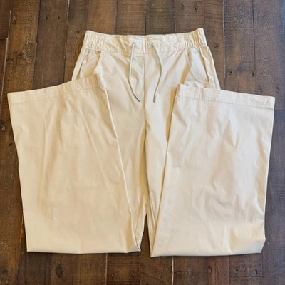 Pantalones Nike Sportswear Essential tejidos tiro alto para mujer S 28x31 blancos pierna ancha Foto 1 de 4