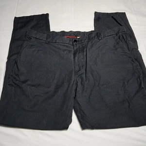 Pantalones chinos Lululemon Commission para hombre 40 negros frente plano 32" entrepierna elástica - Imagen 1 de 10