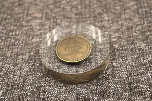 Carrier Air Conditioning Golden Anniversary Bronze Coin 1973 acrylic paperweight - Picture 1 of 5