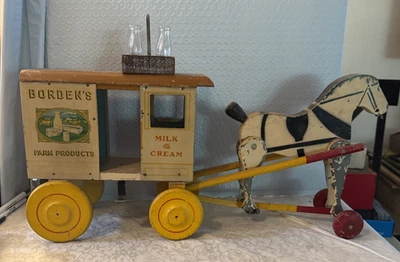 Carruaje de caballos de colección Rich Toys BORDEN'S MILK & Cream litografía + juguete para tirar de madera Foto 1 de 4