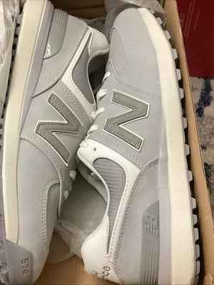 Zapatos de golf New Balance 574 verdes para mujer Foto 1 de 4