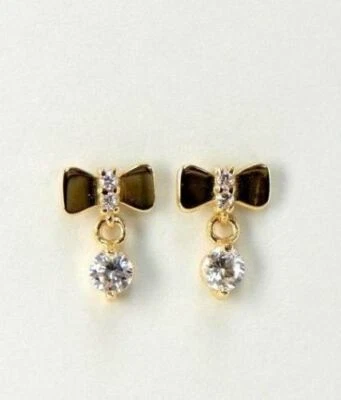 Aretes con pajarita de oro blanco o amarillo macizo de 14k con circonita cúbica Foto 1 de 4