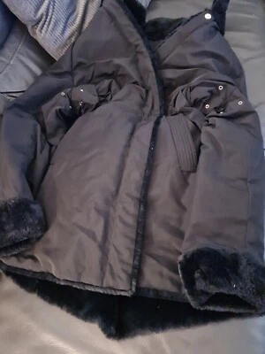 abrigo impermeable reversible geox piel negra Foto 1 de 4