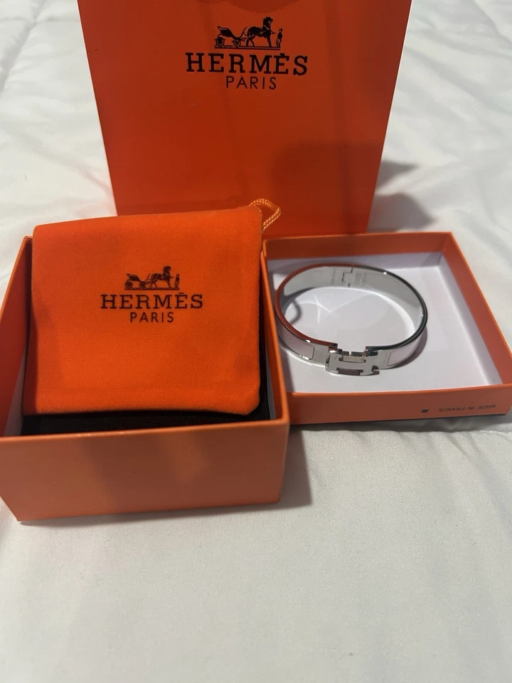 Brazalete pulsera Hermes Clic plateado y blanco para mujer Foto 1 de 4