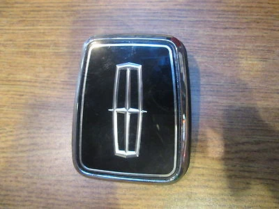 NOS 1988 1989 LINCOLN CONTINENTAL TRUNK LOCK CYLINDER COVER & SLEEVE - Image 1 of 3