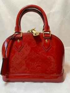 Bolso de mano Louis Vuitton con monograma Vernis Alma BB M91771 auténtico usado envío gratuito - Imagen 1 de 11