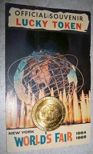 Vintage 1964 Postcard The Unisphere New York Worlds Fair 1964-65 Lucky Token - Picture 1 of 2