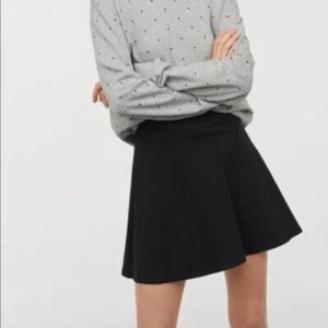 H&M Women’s Size Small Mini A-Line Flare Skirt Textured Black Elastic Waist - Picture 1 of 9