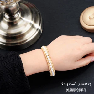 Bracciale AAA++ 5-6mm vero naturale bianco mare del sud perle rotonde placcatura oro 18k - Foto 1 di 5