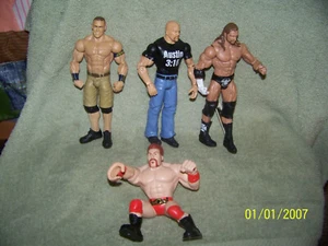 vintage w.w.e  w c w  wrestling action figures lot of {7} { {used mixed lot} - Picture 1 of 2