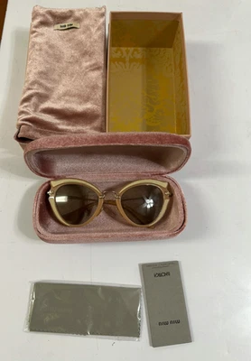 Gafas de sol Miu Miu para mujer negras doradas ojo de gato SMU05S VIE-0A7 52-23-140-Italia Foto 1 de 4