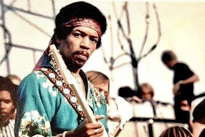 JIMI HENDRIX AT A FESTIVAL JAMMING.THIS IS REPRINT GREAT PHOTO  FOR  FRAMING! - Image 1 of 4