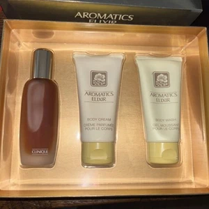 CLINIQUE AROMATICS ELIXIR 100ML PERFUME SPRAY/ 75ML BODY CREAM/ 75ML BODY WASH - Picture 1 of 3