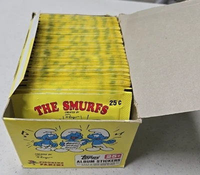 De colección 1982 Topps Pitufos Pegatinas Topps Álbum Pegatinas 100 Paquetes Totalmente Nuevo Foto 1 de 4