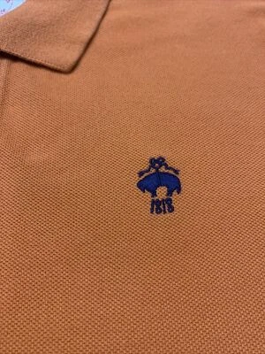 Camisa polo Brooks Brothers 1818 roja polar melocotón para niños Foto 1 de 4