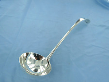 AN ANTIQUE STERLING SILVER OLD ENGLISH SOUP LADLE, LONDON 1907.