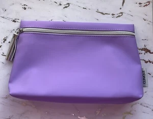 CLINIQUE BORSA TRUCCO VIOLA E ARGENTO - Foto 1 di 7