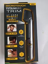 Microtouch Titanium Trim: Haircut & Body Groomer with 5 Comb Attachments & Light