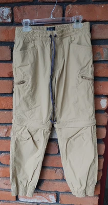 Pantalón Jogger Convertible Eddie Bauer Niños Cremallera a Pantalones Cortos Caqui Talla 10 Foto 1 de 4