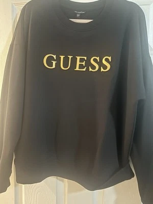 Suéter cuello redondo negro y dorado GUESS para mujer Foto 1 de 4