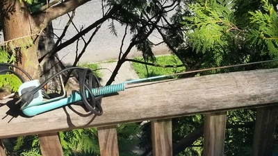 VINTAGE IRONING BOARD ATTACHMENT CORD HOLDER - Image 1 of 4