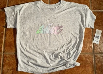 Camiseta Adidas Gris Niña Grande Manga Corta Gráfica Con Nudo Lateral Lazo Talla Med Foto 1 de 4