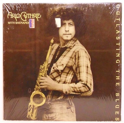 Arlo Guthrie – Outlasting The Blues - 1979 Warner Bros. Blues/Jazz Rock LP EX - Imagem 1 de 4
