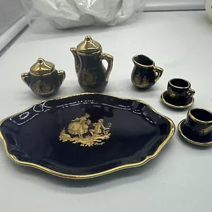 Set da tè vintage in miniatura porcellana Limoges 10 pezzi elegante con accenti oro - Foto 1 di 7