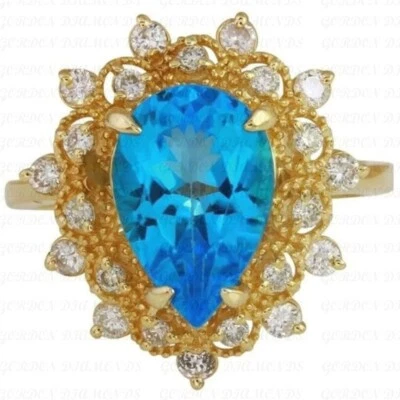 Anillo de compromiso de diamantes y topacio natural talla pera de 5,50 quilates enchapado en oro amarillo de 18 quilates Foto 1 de 4