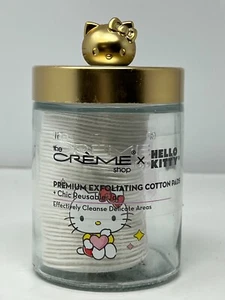 The CREME Shop X HELLO KITTY 50 almohadillas exfoliantes de algodón en tarro de vidrio reutilizable - Imagen 1 de 3