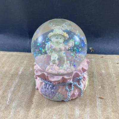 Querubín Dreamsicles con corazones en globo de nieve, combinar ENVÍO $1 Foto 1 de 3