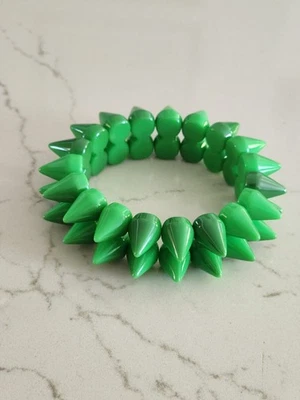 Pulsera retro vintage de plástico con espiga verde elástica elástica Foto 1 de 4