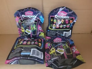 DISNEY DOORABLES NIGHTMARE BEFORE CHRISTMAS BLACKLIGHT FIGURES BOX OF 24 PIECES - Picture 1 of 4