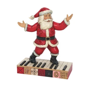 Jim Shore Topping out a Christmas jingle - Babbo Natale su tastiera 6010853 NUOVO per 202 - Foto 1 di 4