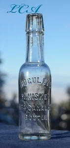 Mini botella MUESTRA HUGULEY'S WHISKY 134 Canal Street TOTALMENTE en relieve 1/10 PINTA - Imagen 1 de 4