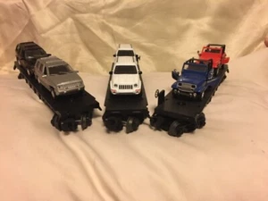Jeeps (1/43) on Lionel Flats Plus Free One - Picture 1 of 5