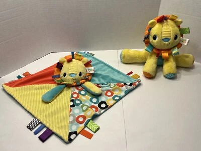 Bright Starts Taggies 狮子毛绒黄色摇铃标签填充动物和可爱阅读 — 第 1/4 张图片