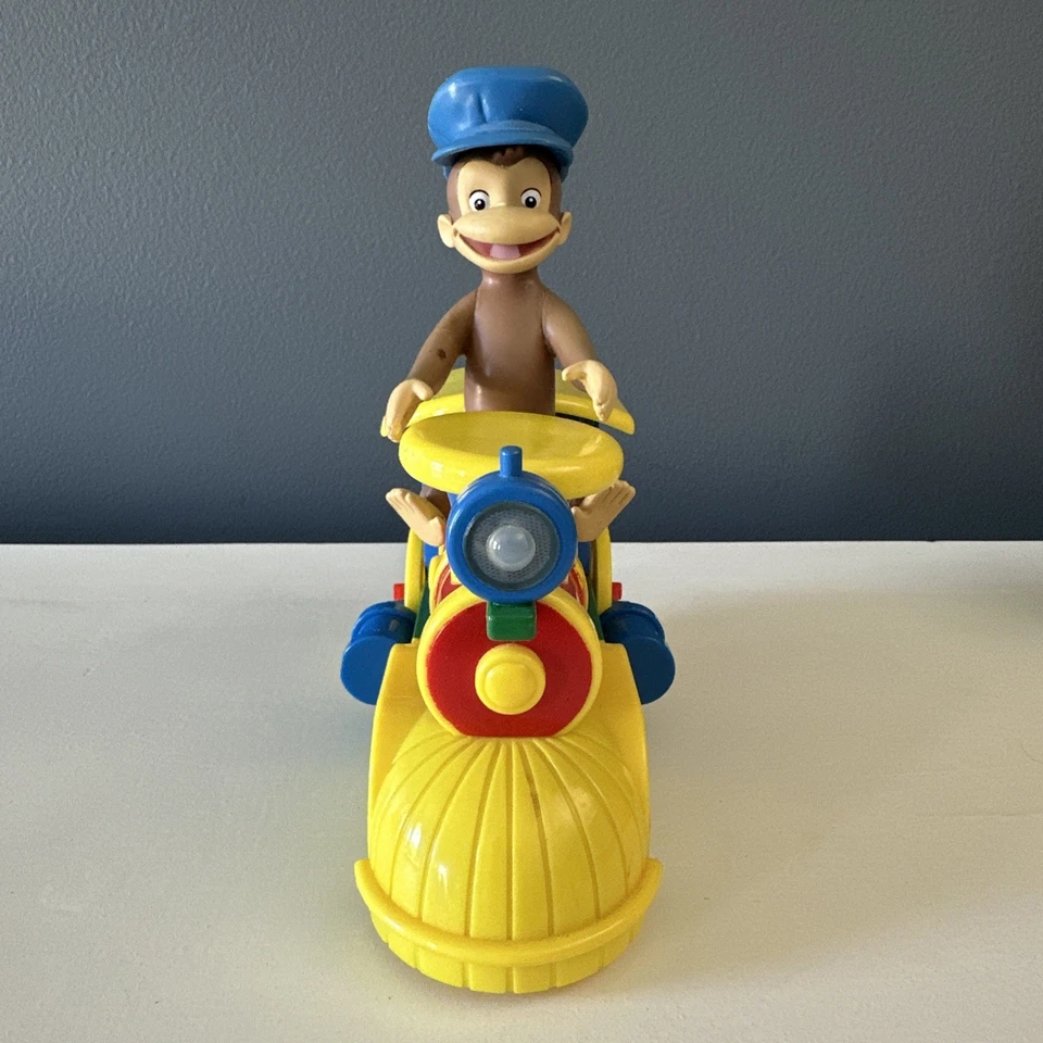 Juguete de tren Curious George Bump & Go de colección (no funciona) Foto 1 de 4