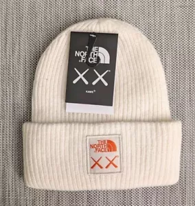 NWT NEW Kaws x The North Face TNF XX Beanie Ivory / Orange Hat - Picture 1 of 3