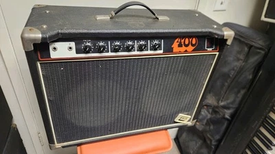 Винтажный гитарный комбоусилитель Univox 400 Stage 2x10 210 А - Изображение 1 из 4