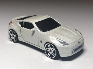 3 pollici 2009 Nissan 370Z Maisto 1/64 pressofuso come nuovo sciolto - Foto 1 di 5