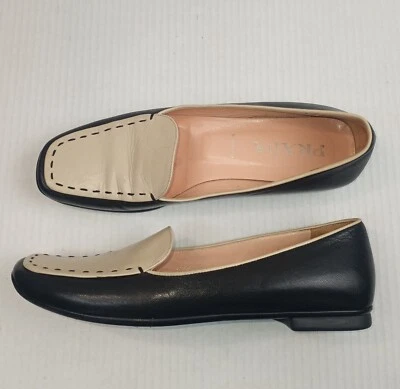 Mocasines de lujo PRADA de cuero negro marfil dos tonos con punta cuadrada sin cordones talla 38,5 Foto 1 de 4