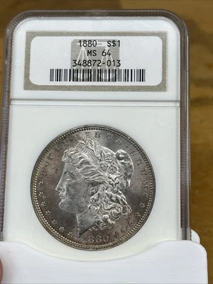 1880 Morgan Silver Dollar PCGS MS64 Nice Peach Color Toning On Obverse - Image 1 of 2