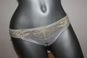Tanga Triumph "Supreme Temptation" talla 40 tul gris con encaje amarillo - Imagen 1 de 5