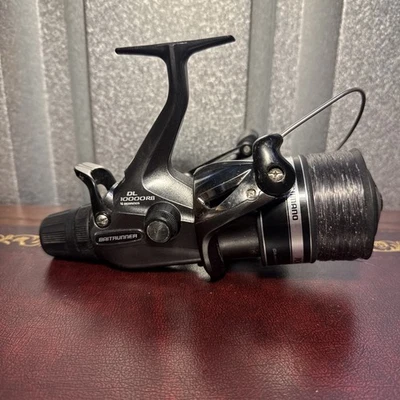 Carrete de pesca Shimano DL10000RB Baitrunner. Carrete de pesca, envío y devolución gratuitos del Reino Unido  Foto 1 de 4