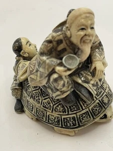 Vintage handgeschnitzte japanische Harzfigur Mann in Schildkröte - Bild 1 von 13